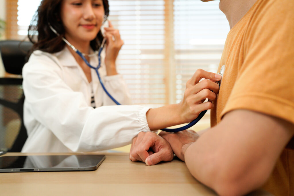Doctor using a stethoscope checking patient with examining, presenting results symptom and recommend treatment method, Healthcare and medical concept